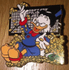 Gold Coins and Bills with Scrooge McDuck on Pin